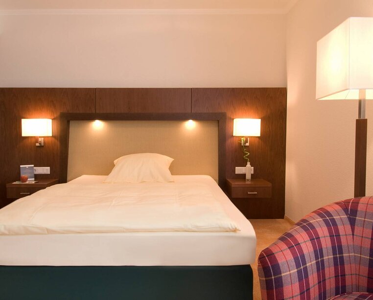 Geschmackvoll eingerichtete Zimmer in unterschiedlichen Farben im 4 Sterne Hotel Ringhotel Appelbaum in Gütersloh | © Ringhotel Appelbaum in Gütersloh