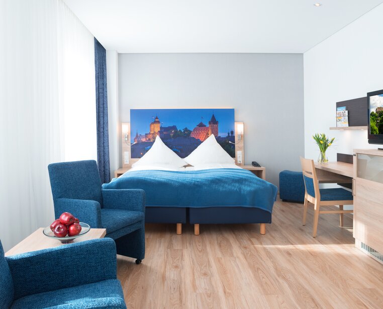 Modern tasteful designed comfort rooms at the 4-star hotel Ringhotel Loew´s Merkur in Nuremberg | © Peter Hülsberg