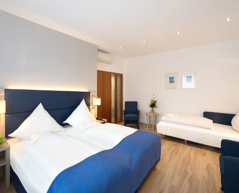 Moderne geschmackvoll eingerichtete Zimmer im 4 Sterne Hotel Ringhotel Loew´s Merkur in Nürnberg | © Peter Hülsberg