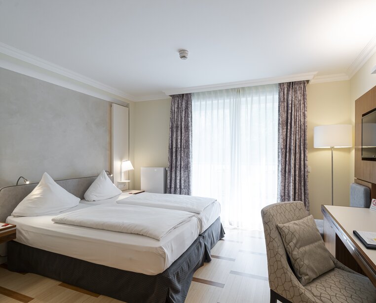 Doppelzimmer mit Balkon im 4-Sterne-Superior-Hotel Ringhotel Strandblick in Kühlungsborn | © DomusImages und Ringhotel Strandblick in Kühlungsborn