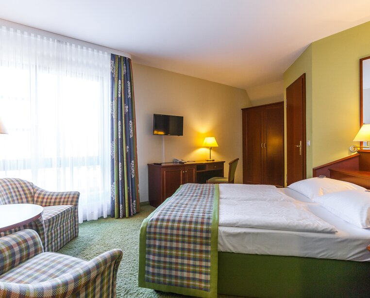 Well equiped rooms with seating area in the 4-star hotel Ringhotel Warnemuender Hof in Rostock-Warnemuende | © Ringhotel Warnemünder Hof in Rostock-Warnemünde