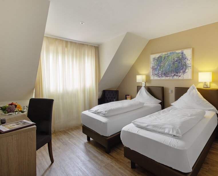Individuell eingerichtete Hotelzimmer im Ringhotel Zum Goldenen Ochsen in Stockach, 4 Sterne Hotel am Bodensee | © Ringhotel Zum Goldenen Ochsen, Stockach