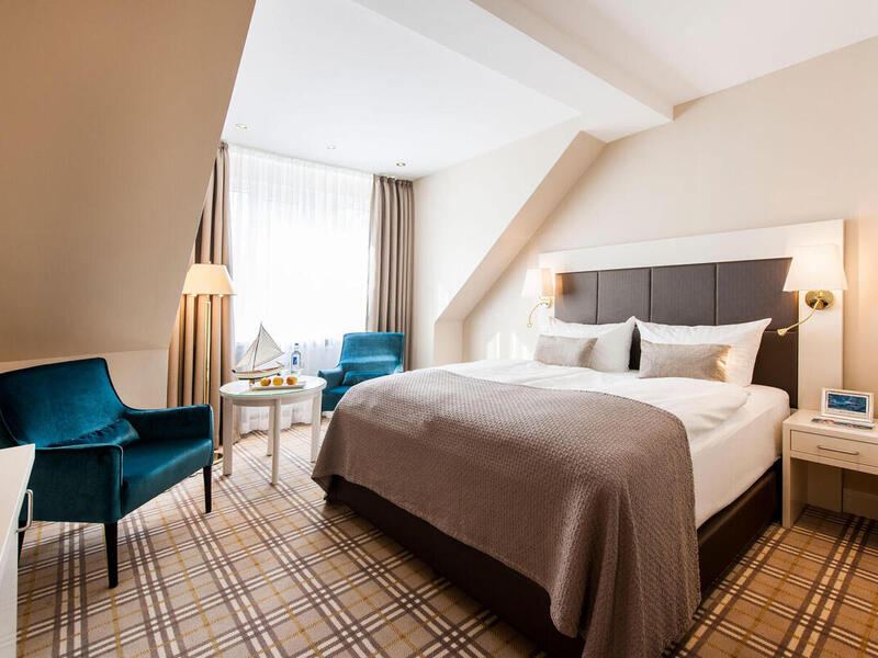 Komfortable große Doppelbetten versprechen einen erholsamen Schlaf im 4 Sterne Hotel Ringhotel Birke in Kiel